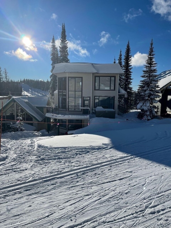 Backside/mountainside of house. Alpine Meadows chair just to left of image.