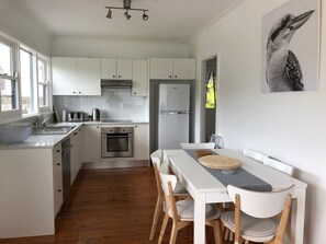 Modern eat in kitchen - table extends for 8 people