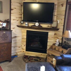 gas fireplace and flat screen TV