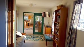 Looking east from the media room toward the kitchen area
