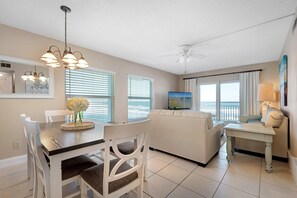 Indulge in oceanfront dining with seating for six at this stylish dining room, offering a perfect corner view of both the pool and the beach