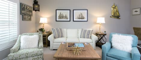 Nicely decorated Living area with sofa sleeper