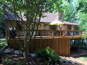 Side view of deck living and lower covered porch dining and living space