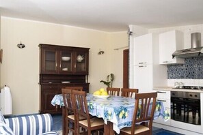 Dining room and kitchen of Stella apartment