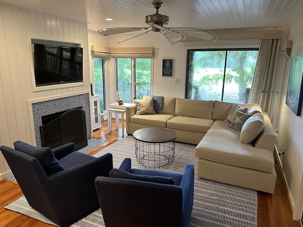 Large open floor plan with new seating for cozy days and nights.