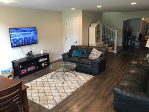 Family room which has a flat screen tv 