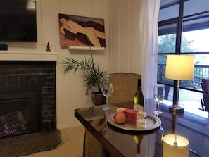 Enjoy a glass of wine, great views, and fireplace all at same time!