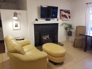 Re-furbished living room with gas fireplace.