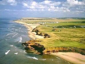 Thunder Cove beach is beyond the headland