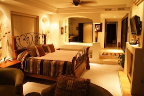 Master bedroom - California King bed, fireplace, DirecTV 10 Jet Jacuzzi tub.