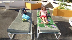 Sun Bathing to show off when you get back!
