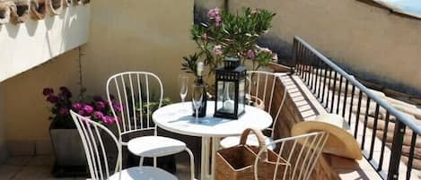 Sunny terrace for al fresco dining and enjoying a glass of prosecco