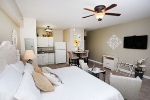 King size studio with full kitchen; refrigerator, microwave, dishwasher, standard coffee pot