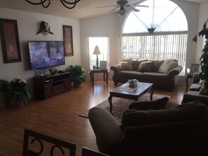 Living Room with 65 inch Flat Screen TV 