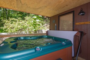 When you’re in the tub, the cover doesn’t obstruct your view.  