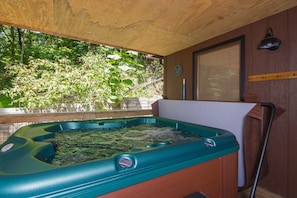 When you’re in the tub, the cover doesn’t obstruct your view.