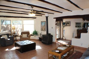 Plenty of seating in main living area, ceiling fan, tv and dvd player. 

