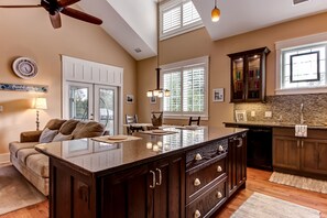 Tall ceilings create a spacious atmosphere. 