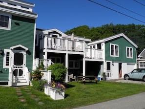 Unit B is in the middle. Unit C is over the garage. View of decks.