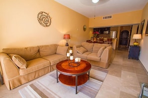 Livingroom with queen size sofa sleeper for 2 more people to enjoy the condo.