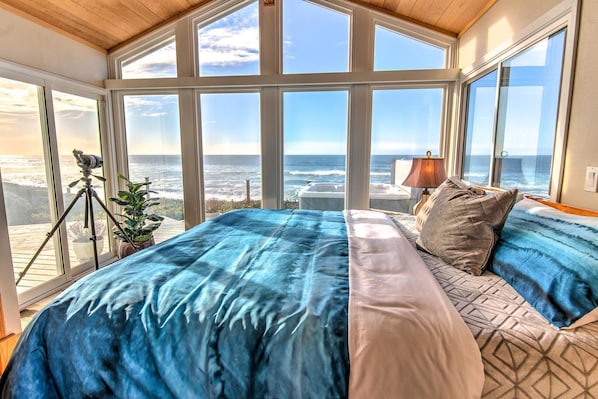 Let the ocean surround you in the upstairs primary bedroom.