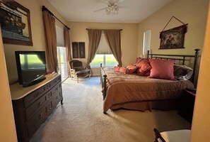 Primary Bedroom - king size bed with walk in closet. 