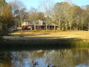 View of the house from the fishing pond.

