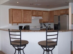 Kitchen (opens to Dining Room & Living Room)