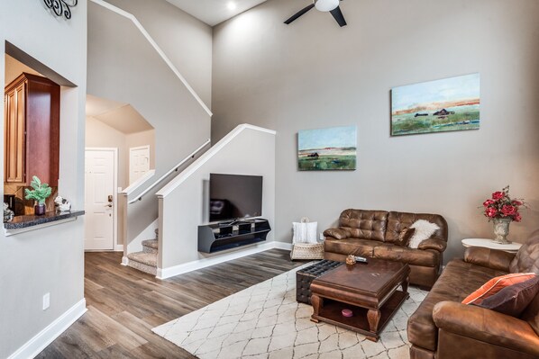 Living room with 60" Samsung Smart TV with Roku Player (Youtube TV is included)