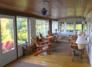Spacious lakeside porch. Great for relaxing, cocktails and candlelit dinners