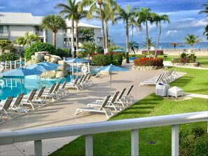 Poolside/ocean view from our condo's private large balcony