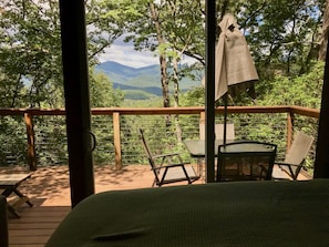 Deluxe Eco Cabin - Sleeps 2-4

View from bed into valley.