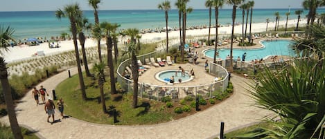 Tropical beach front pool area with kiddie pool