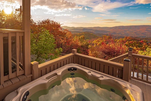 Back deck hot tub with stunning valley and mountain views!.