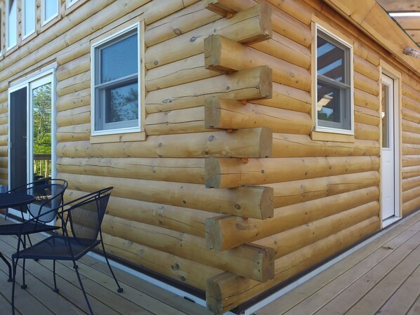 The deck level accesses the main floor of the cabin.