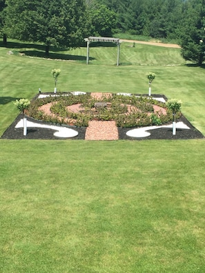 Landscaped labrinth in back yard.