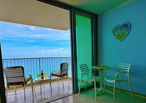Chose your balcony set up. Cushioned relaxing chairs or romantic bistro!