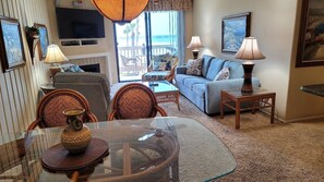 Front door views of the living room and the ocean.