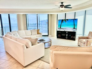 Living room features an extra long Smart TV with cable through DirecTV!