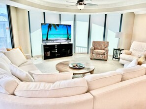 Remote controlled blinds bock out the sun to crystal clear TV viewing!