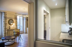 Main entrance view to kitchen and living room
