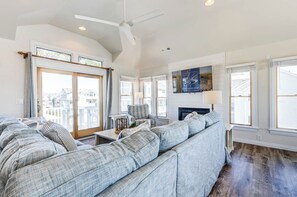 Top-Level Living Room with Deck Access