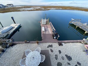 Outside additional seating, over water deck and 1 boat slip.
