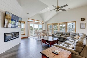 Top-Level Living Room with Deck Access