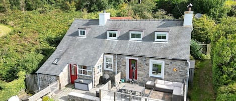 The cottage, in a beautiful secluded spot on the side of the mountain