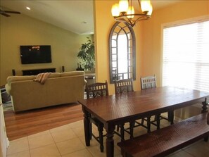 Spacious Dining Area sits up to Eight People Comfortably (Extra Chairs for set)