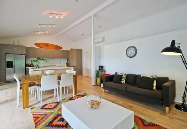 Fresh, light open living area upstairs