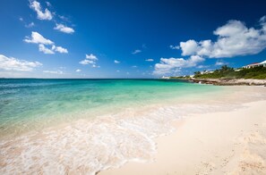 Sandy Point Beach is just a 60-second walk down a paved footpath.