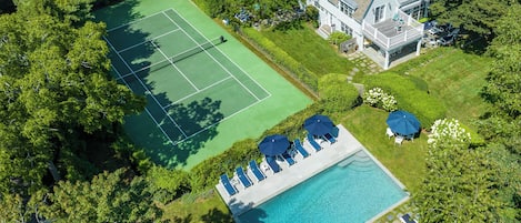 Aerial view of Tennis/Basketball, Pool, and Main house