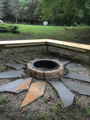 Fire pit outside to enjoy the evenings year round!